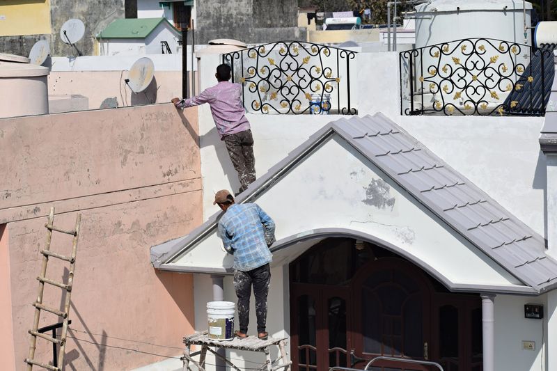 men doing some home maintenance